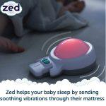 Zed showing red light and vibration. Zed helps your baby sleep by sending soothing vibrations through their mattress.