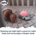 Baby feet showing under blanket and Zed with red light in cot. Relaxing red night light is great for night feeds and encourages a deeper sleep.